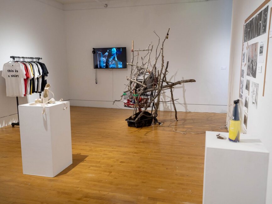 Various art pieces fill a gallery space.