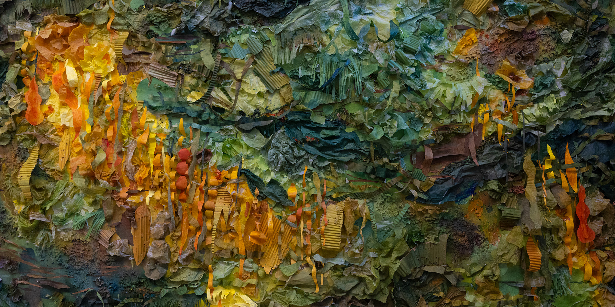 Multilayered collage artwork in blue, green and yellow tones.